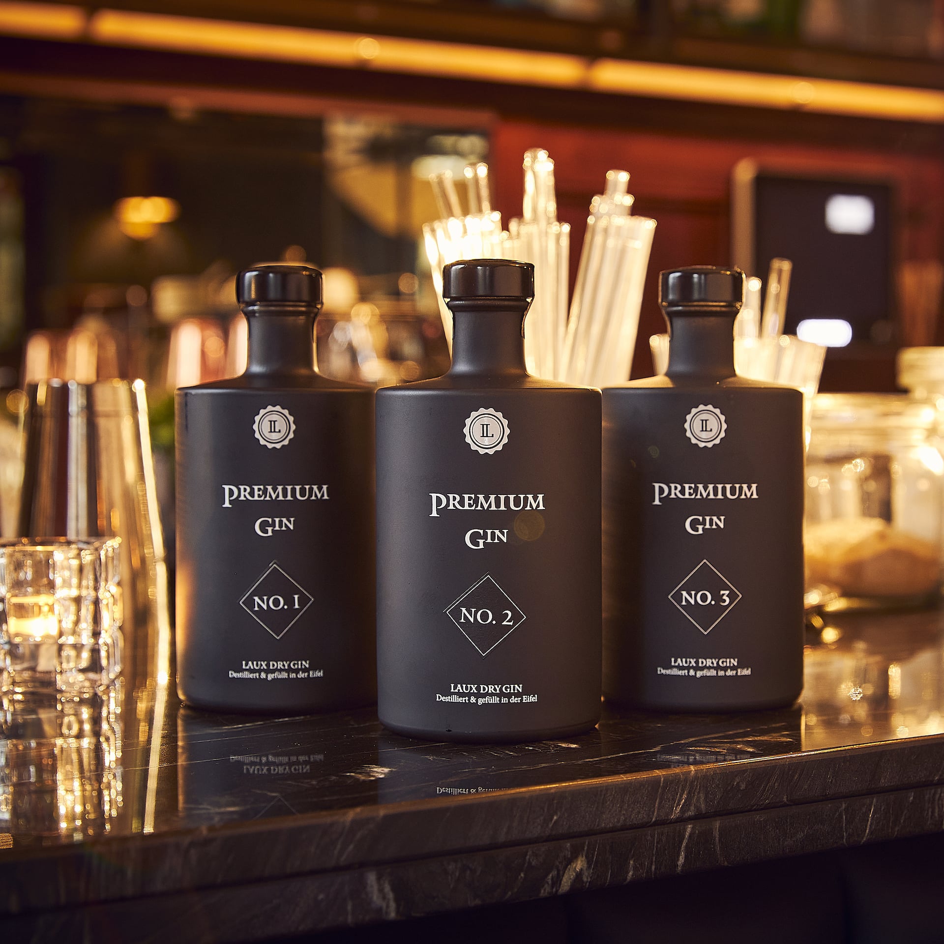 Premium Gins 1, 2 und 3 auf Tresen